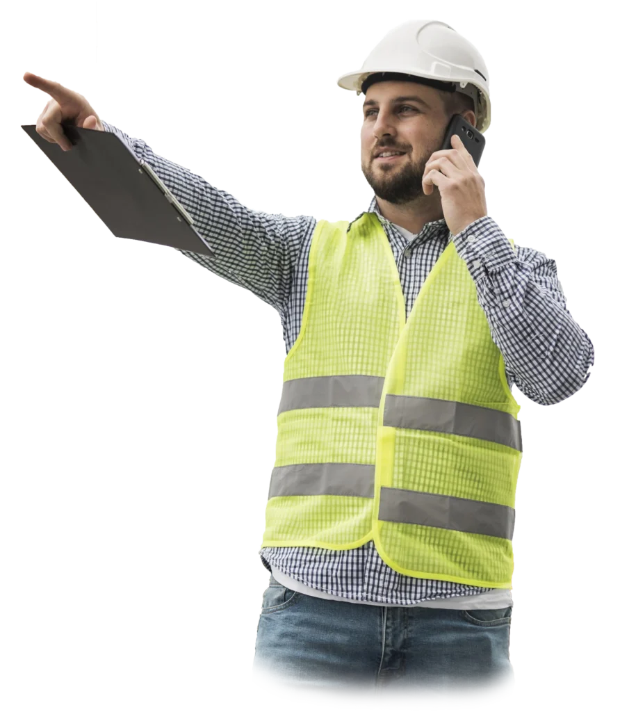 a man in a safety vest and a hard hat holding a clipboard and talking on a cell phone